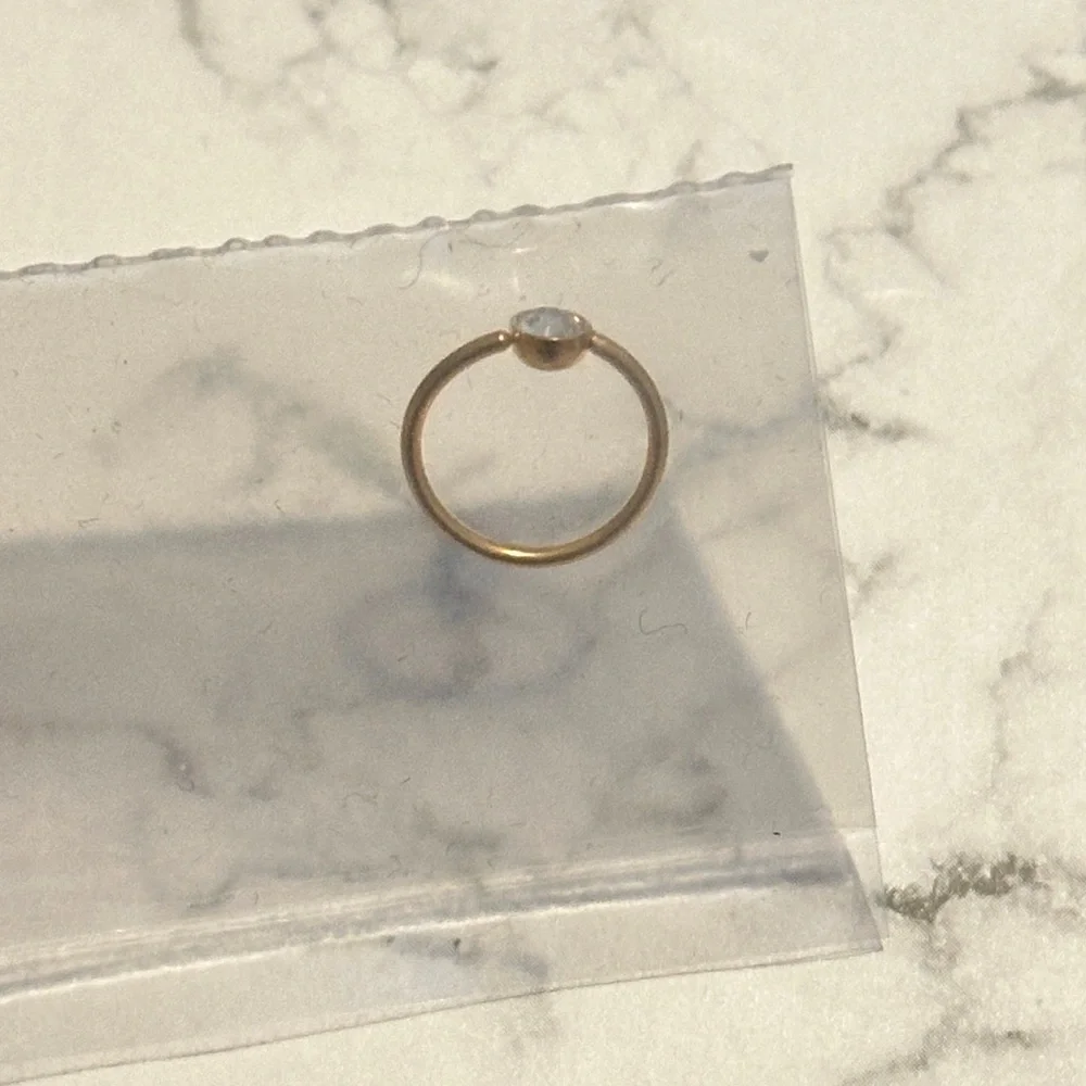 Body Candy 20G 5/16 Gold IP Stainless Steel Bright Clear Gem Nose Hoop - Picture 4 of 7